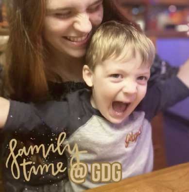 Mother and son enjoying family time at Glory Days Grill.