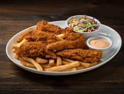 A plate with chicken tenders, french fries and homerun sauce