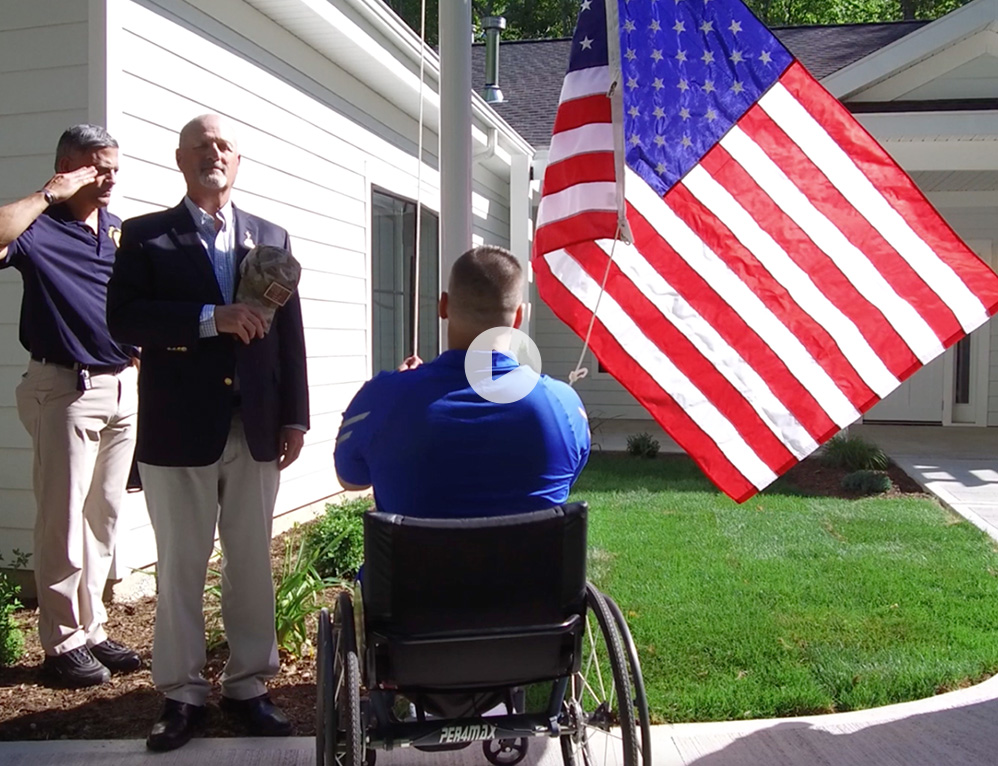 Glory Days Tunnel to Towers video screen grab with play button to prompt you to play the video.