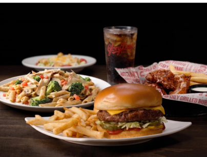 photo of burger with fries, pasta, chicken tenders and fries, and a house salad with a beverage